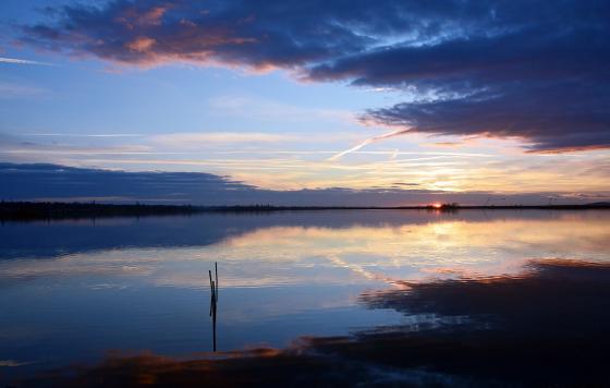 body of water at sunset